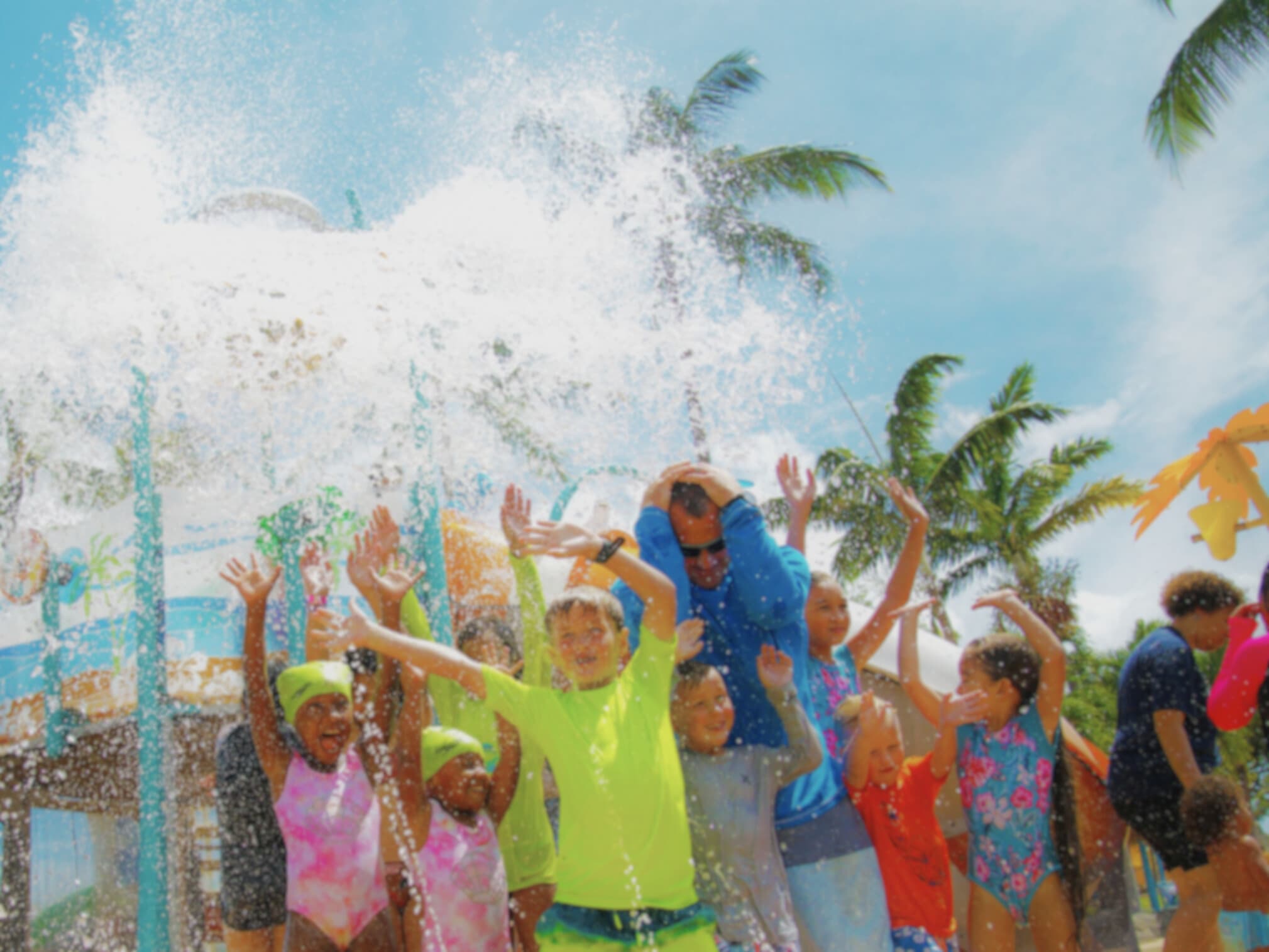 Mom and her kids floating down a raft ride