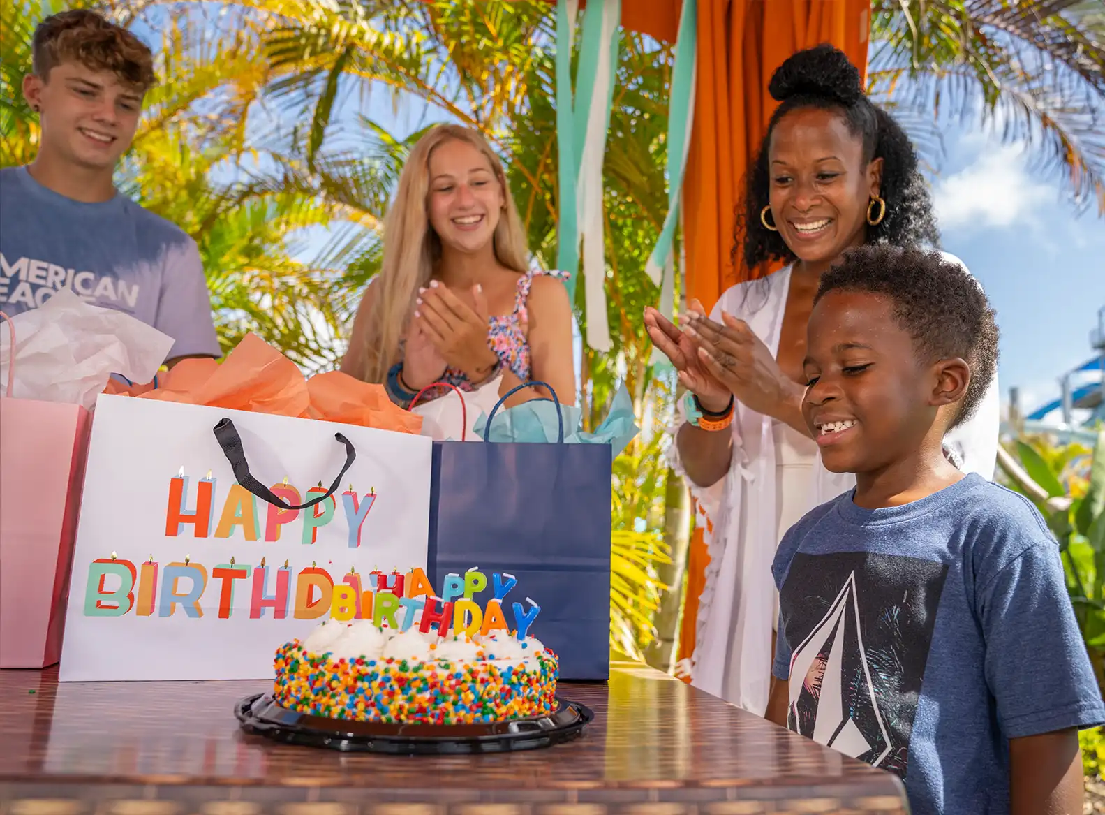 Mom and her kids floating down a raft ride