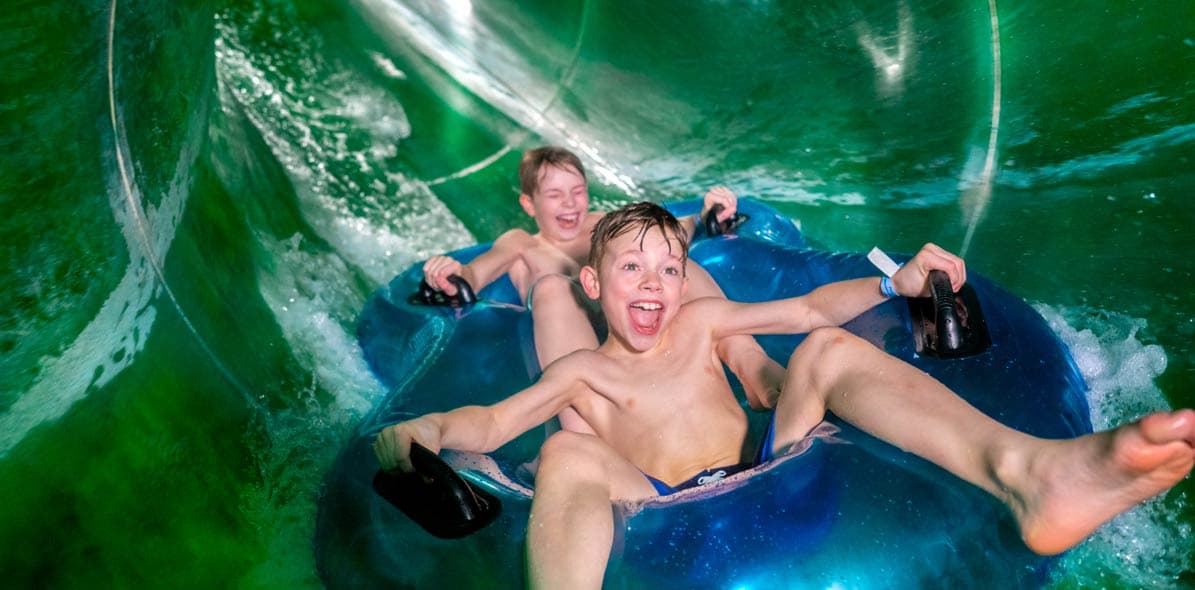 kids riding a waterslide